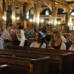 Church of Peace in Swidnica – students are listening to a guide